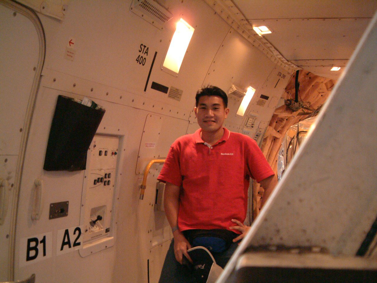 Jerome in the cargo hold during a flight