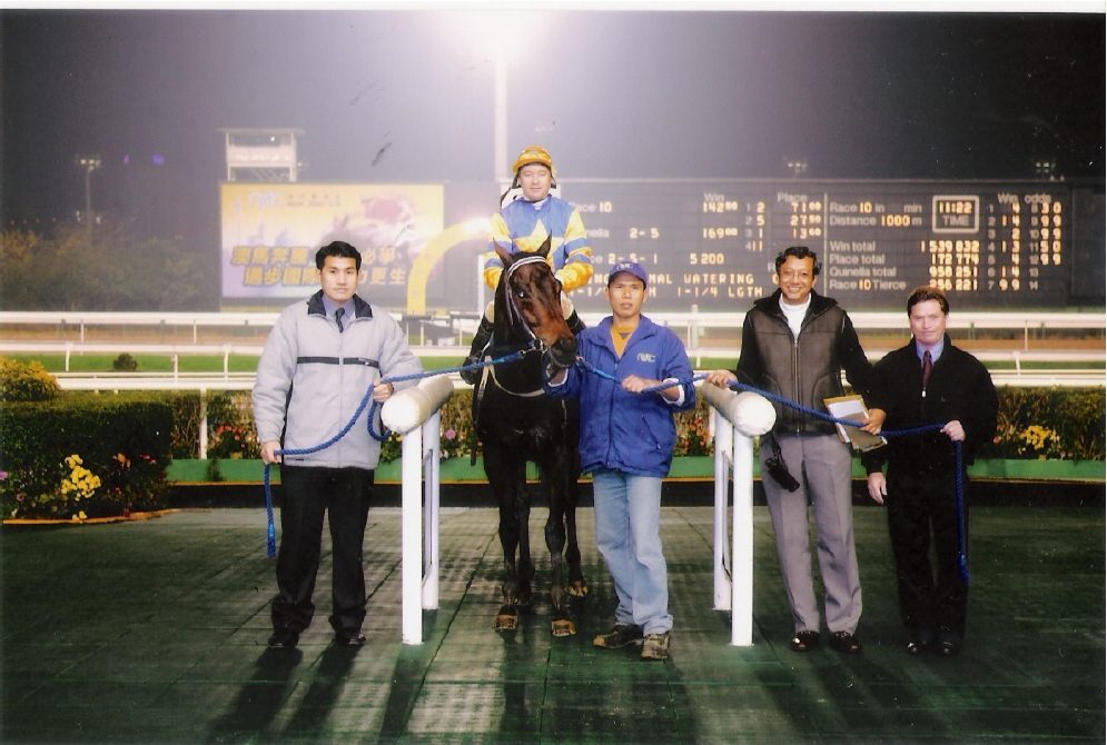 Jerome Goh after wining a horse race in macau at the Macau jockey club